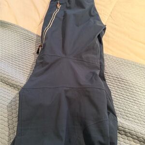 Stio ski  pants, blue with orange zipper pulls.  Size large.  Never worn.